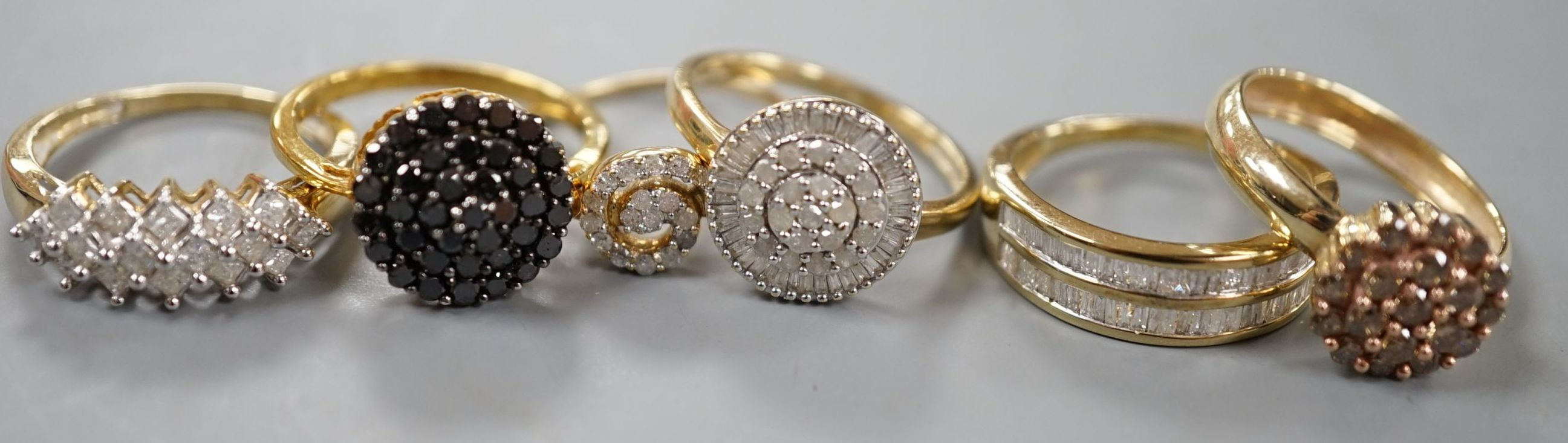 Four assorted modern 9ct gold and white or coloured diamond cluster set dress rings and two similar rings set in gilt 925